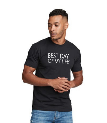 black model with short hair wearing black crewneck t-shirt with BEST DAY OF MY LIFE written in white